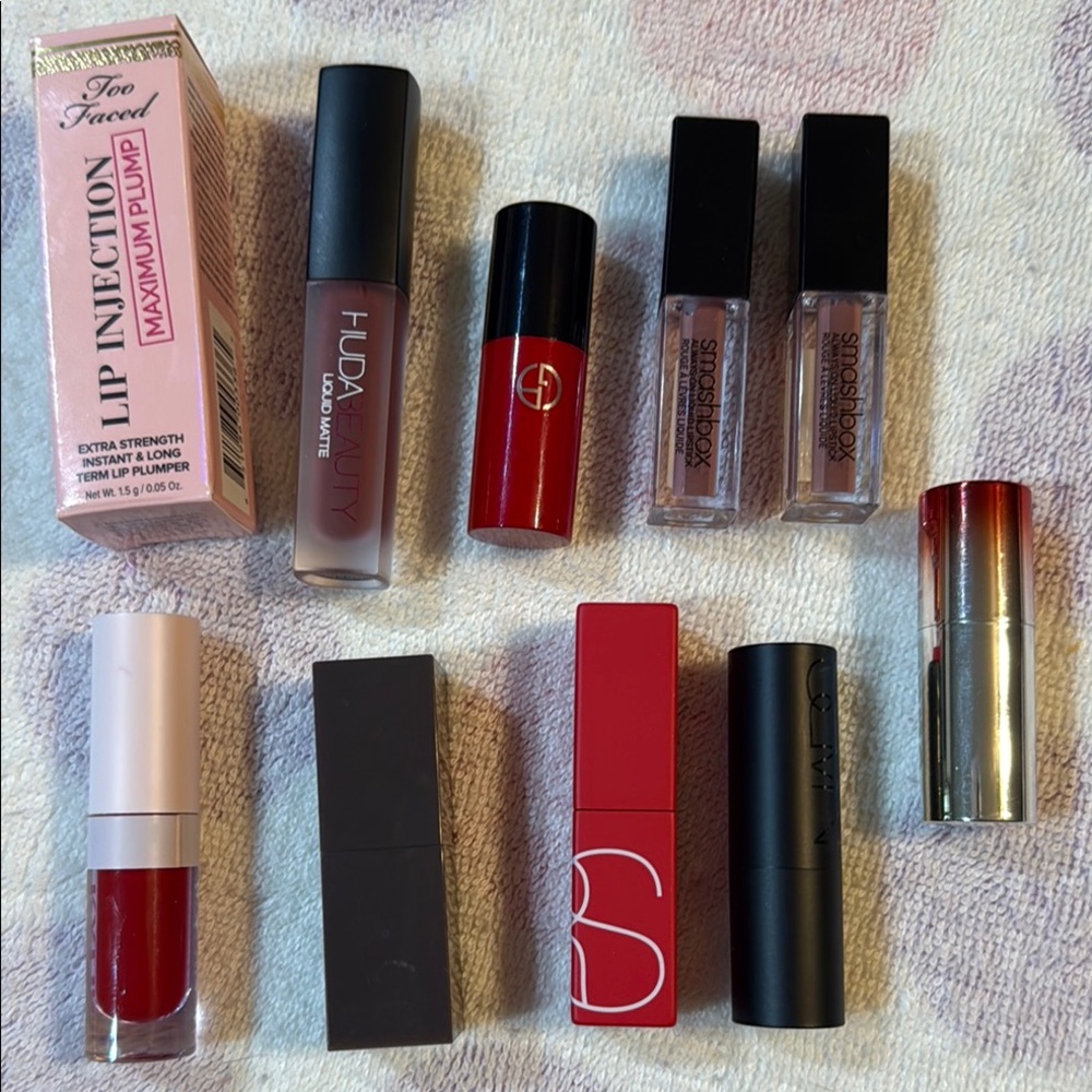 Assorted brands of sample size lip colors